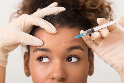 Brow lift in Kenya consultation for brow position and forehead concerns